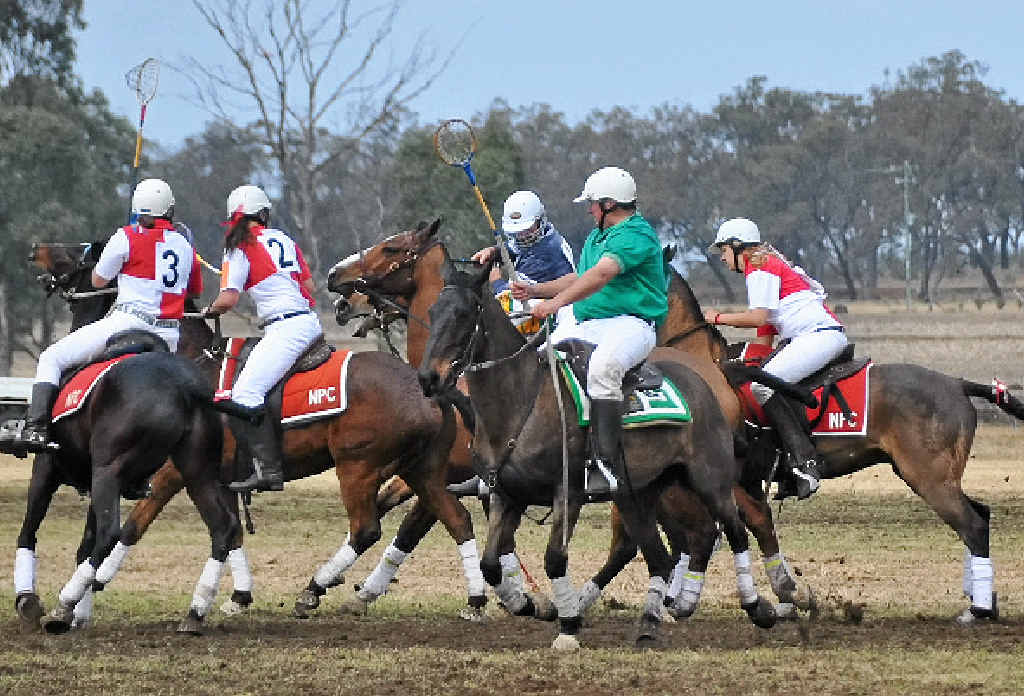 Polocrosse action on an overcast Saturday at the Bony Mountain Recreation Reserve.